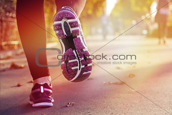 Fitness Girl running at sunset