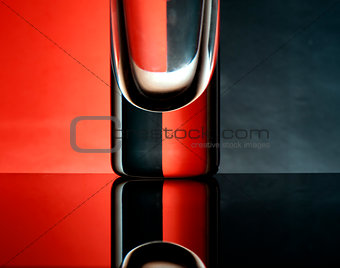 Glass goblets on a colored background