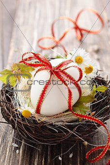 Easter egg in nest.