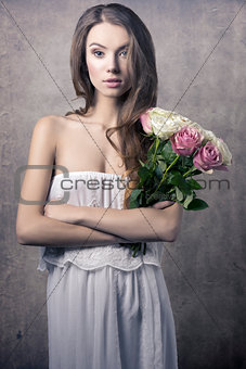 Young girl with flowers