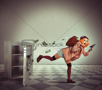 Clown steals from the safe