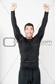 Fitness male athlete celebrating his success