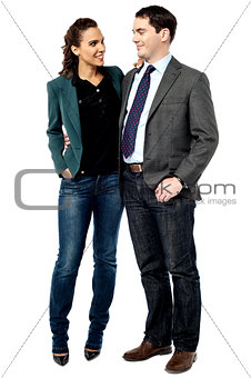 Businessman and woman talking together