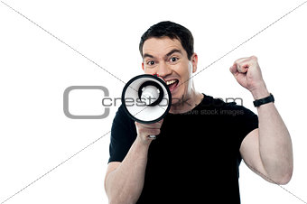 Middle aged man posing with megaphone