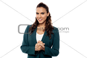 Attractive woman with clasped hands