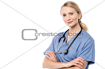 Smiling beautiful doctor with crossed arms