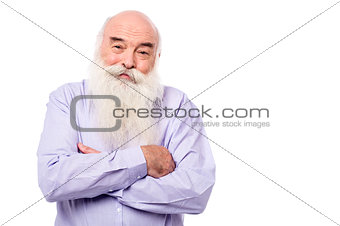 Hoary old man with crossed arms over white
