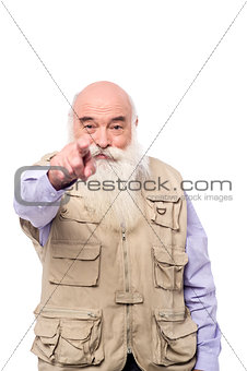Senior man pointing towards you