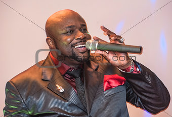 Black African male singing live