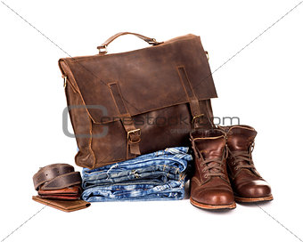 set consisting of jeans belt and bag on a white background