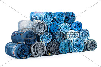 rolled jeanses isolated on a white background