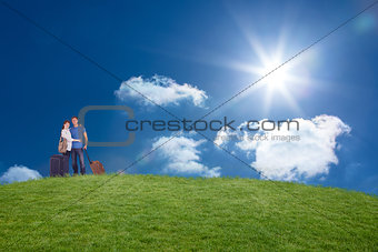 Composite image of happy couple going on holiday