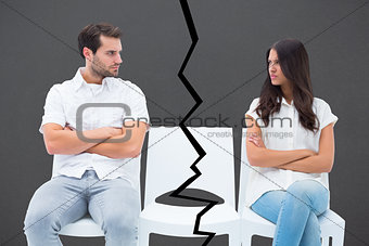 Composite image of angry couple not talking after argument