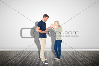 Composite image of young couple having an argument
