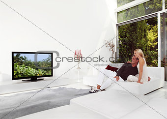 Beautiful Couple Watching TV