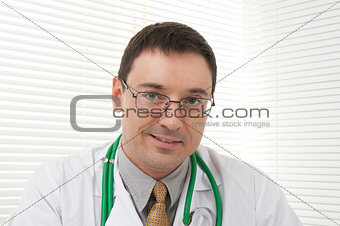 male doctor looking at camera