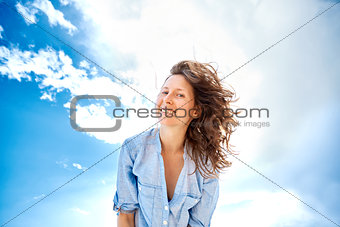 woman against blue sky