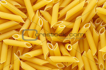 Backgrund of italian penne rigate pasta