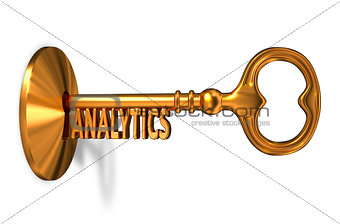 Analitics - Golden Key is Inserted into the Keyhole.