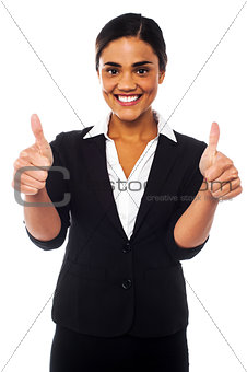 Attractive woman showing double thumbs up