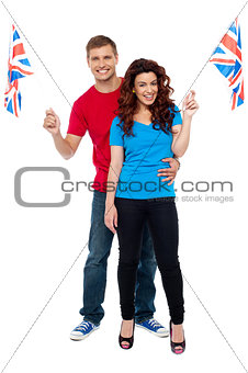 Cheerful UK supporters posing together