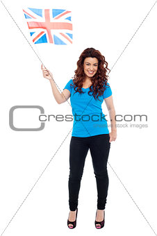 UK female supporter posing with flag