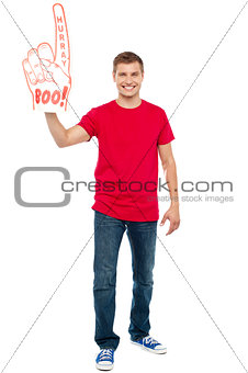 Casual guy showing large pointy boo hurray hand