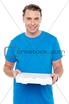 Hungry man holding pizza box