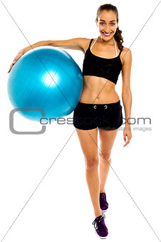Young healthy lifestyle woman with pilates exercise ball