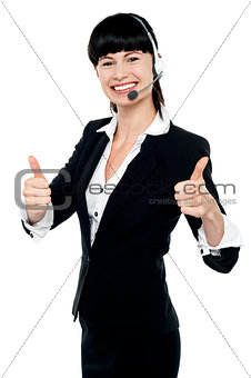 Gorgeous telecaller showing double thumbs up