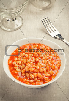 Bowl of baked beans in tomato sauce