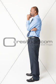 Indian businessman having a thought