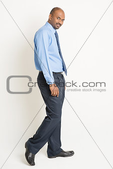 Indian businessman walking