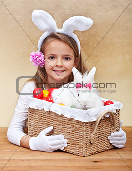 Happy spring girl with easter basket