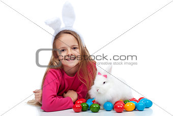 Happy girl with her easter rabbit