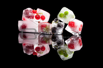 Ice cubes with fruit and vegetable.