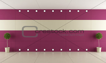 Empty room with purple paneling 