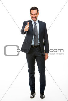 Businessman smiling with thumb up