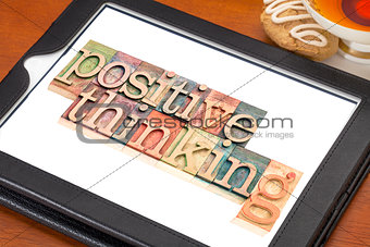 positive thinking typography  on tablet