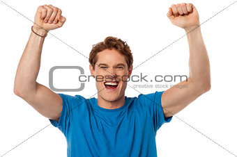 Successful excited isolated young guy