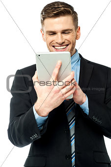Businessman operating tablet device