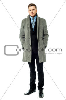 Corporate guy wearing long overcoat
