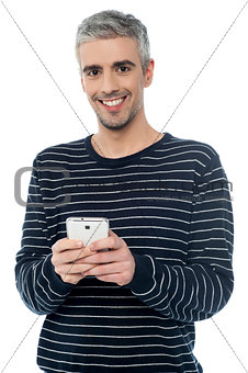 Senior man on smart phone