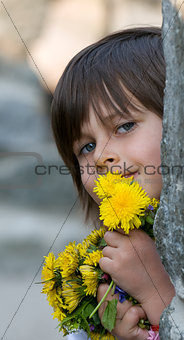 happy girl with yellow flowers