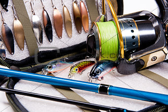 Fishing rod and lures with bag for baits.