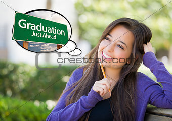 Young Woman with Thought Bubble of Graduation Green Road Sign 
