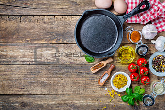 Ingredients for cooking and cast iron skillet