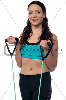 Woman exercising with a resistance band