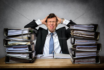 Overworked stressed businessman
