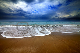 Sea beach and storm clouds